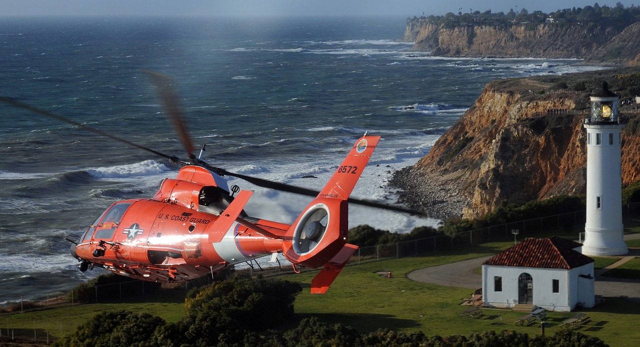 lighthouse helicopter flying free photo