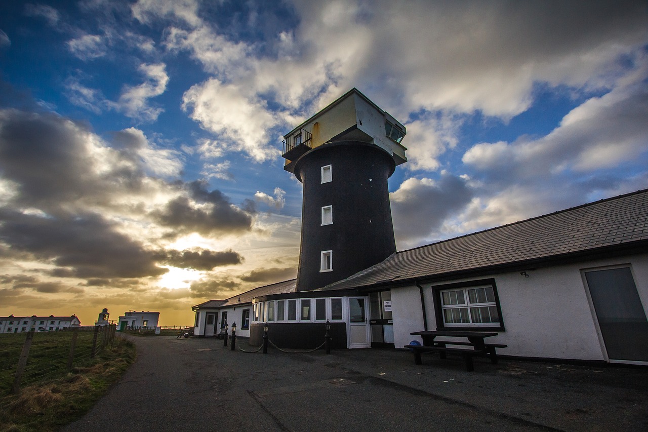 lighthouse sky clouds free photo