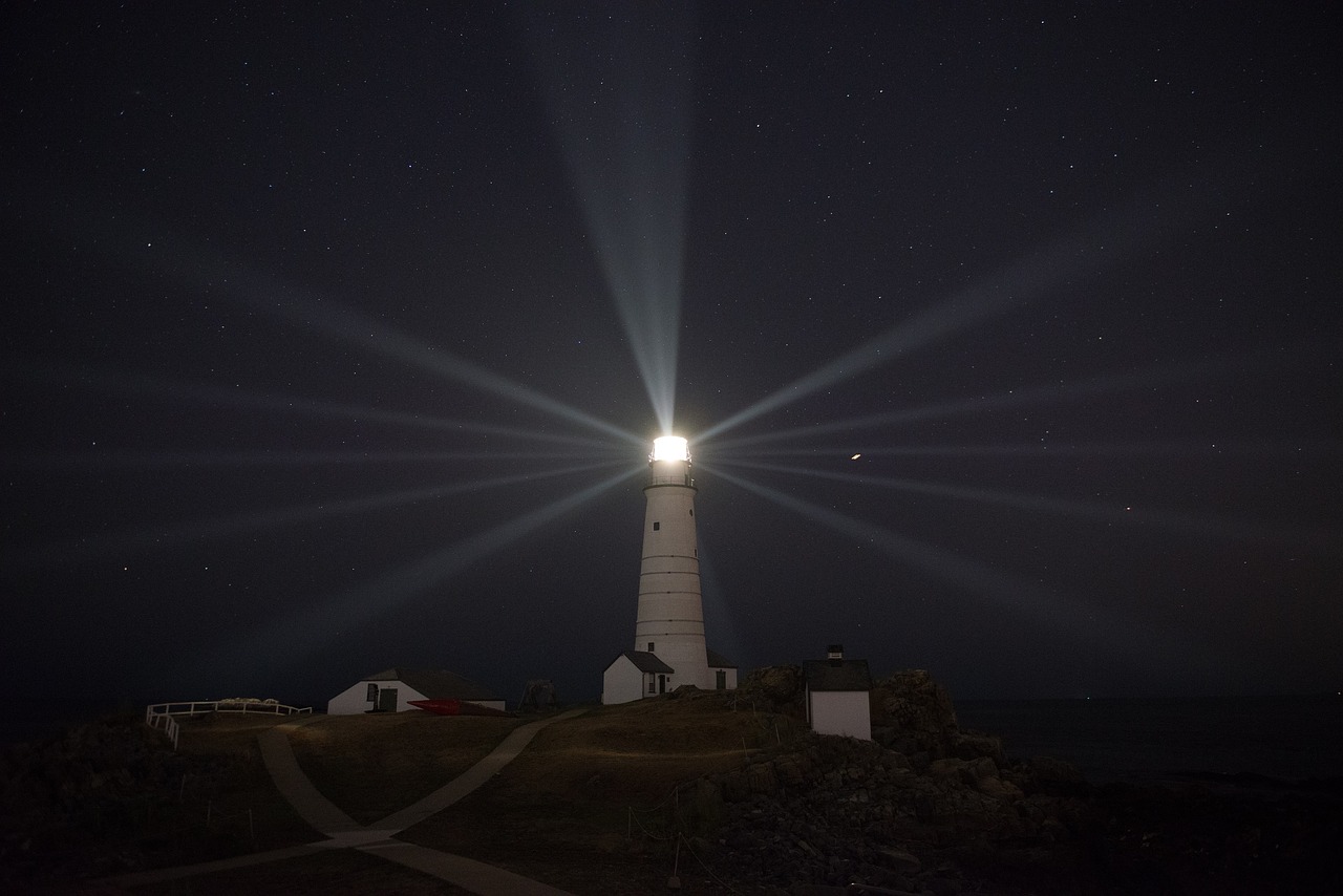 lighthouse night beacon free photo