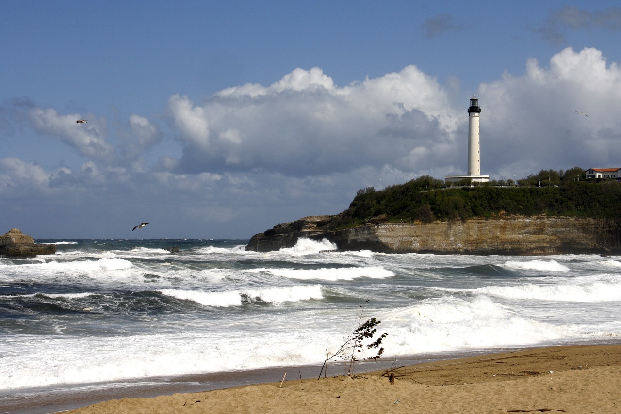 lighthouse sea waves free photo