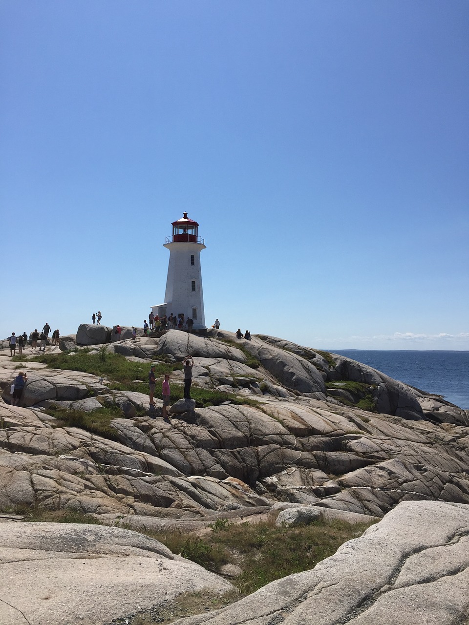 lighthouse rocks coast free photo