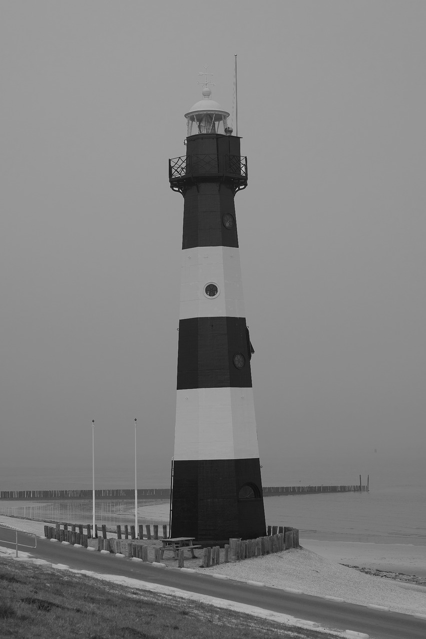 lighthouse black and white sea free photo