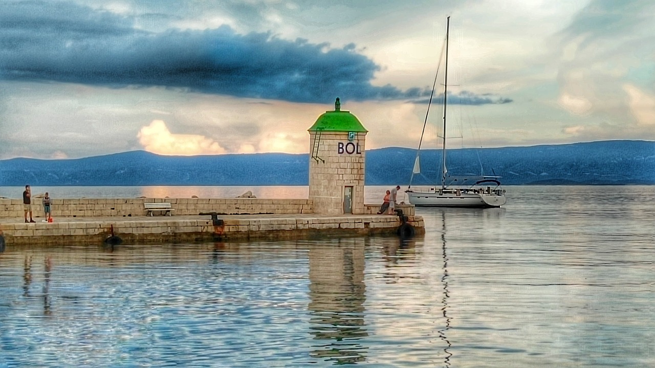 lighthouse sea evening free photo