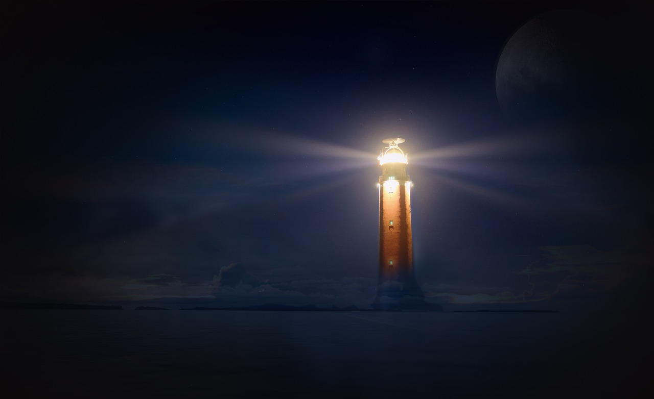 lighthouse glow night free photo