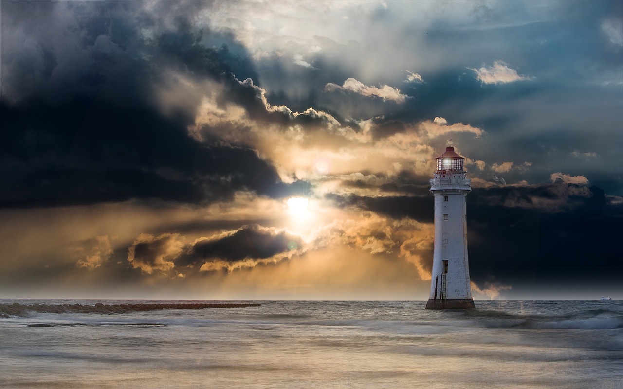 lighthouse glow evening free photo