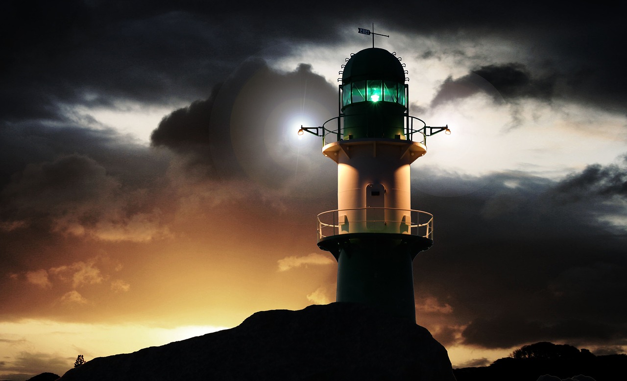 lighthouse beacon night free photo