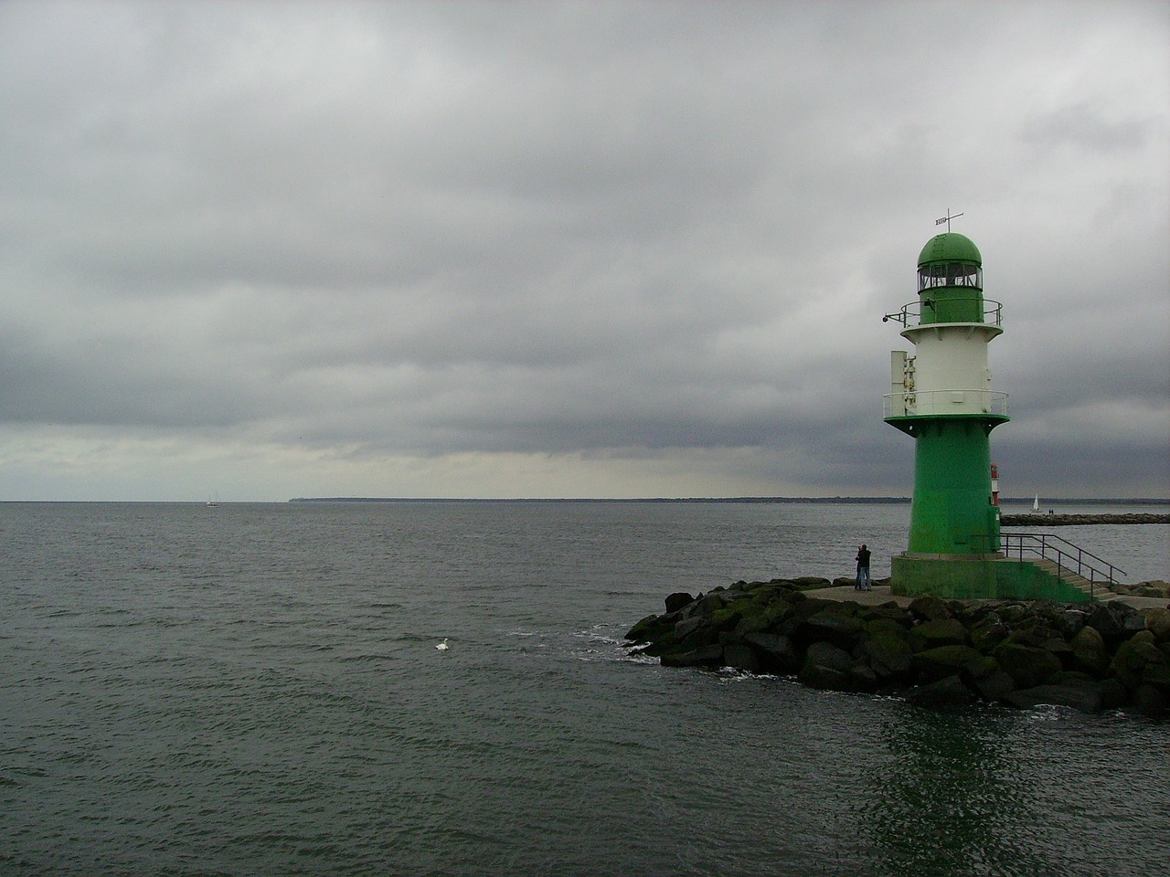 lighthouse sea clouds free photo