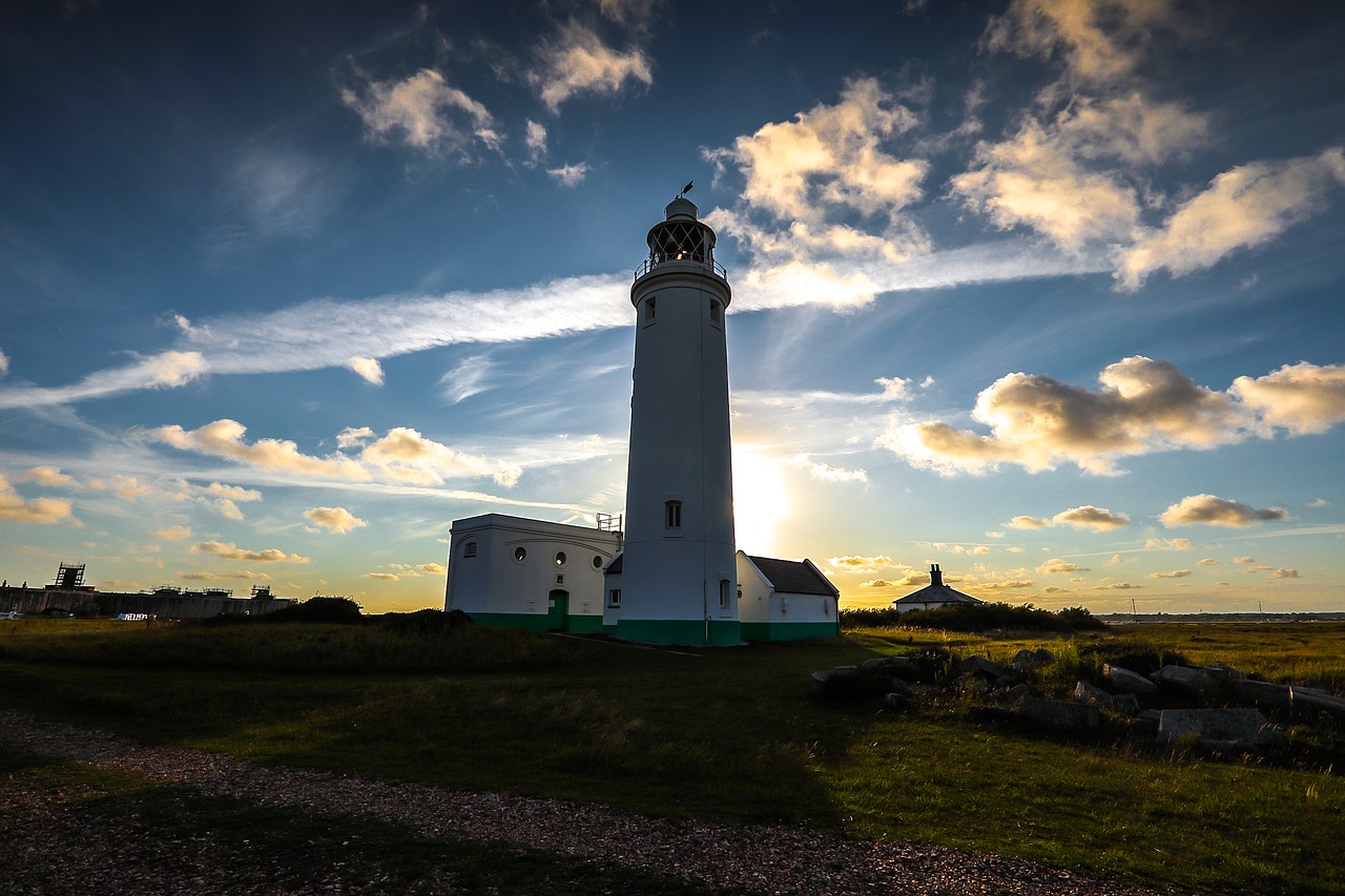 lighthouse sunset coast free photo