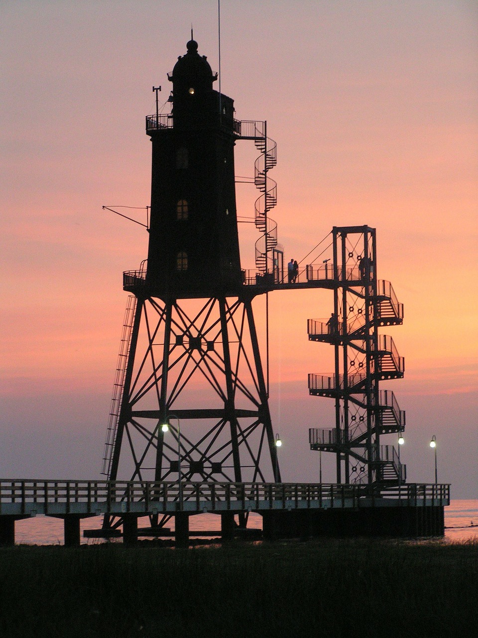 lighthouse north sea coast dusk free photo