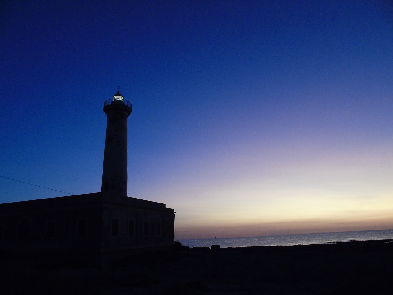 lighthouse dawn sun free photo