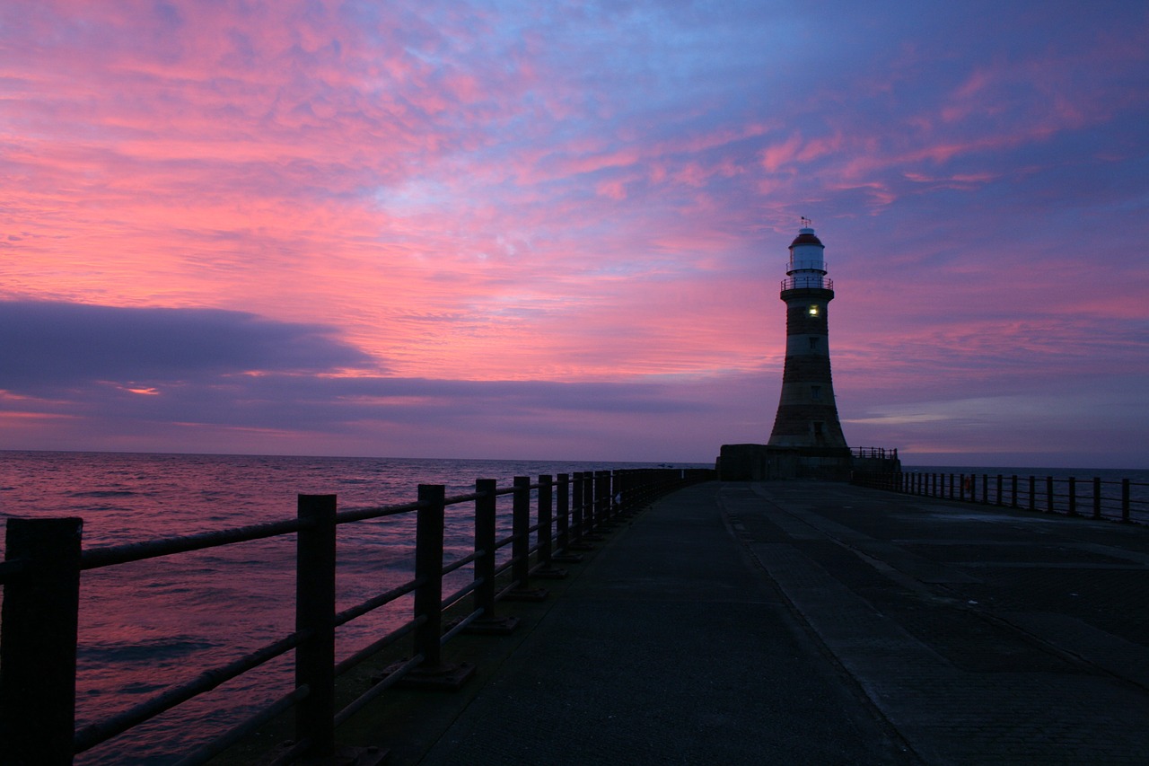 lighthouse sunrise sky free photo