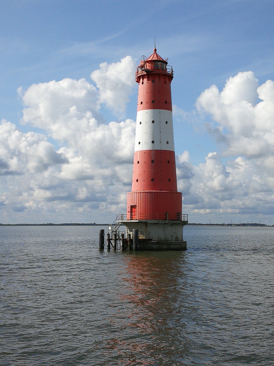 lighthouse clouds sea free photo