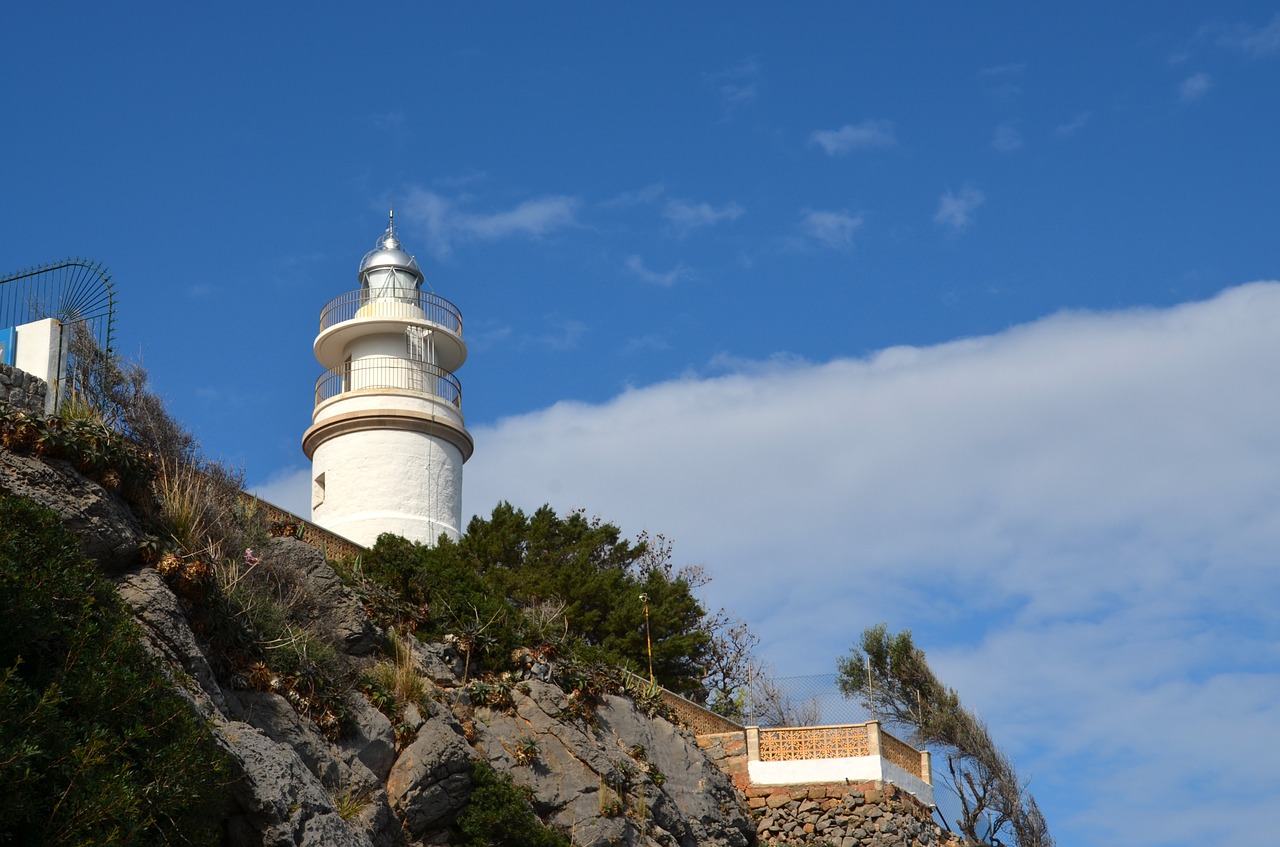 lighthouse sky clouds free photo