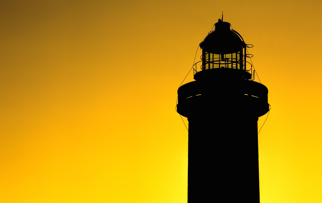 lighthouse silhouette evening free photo