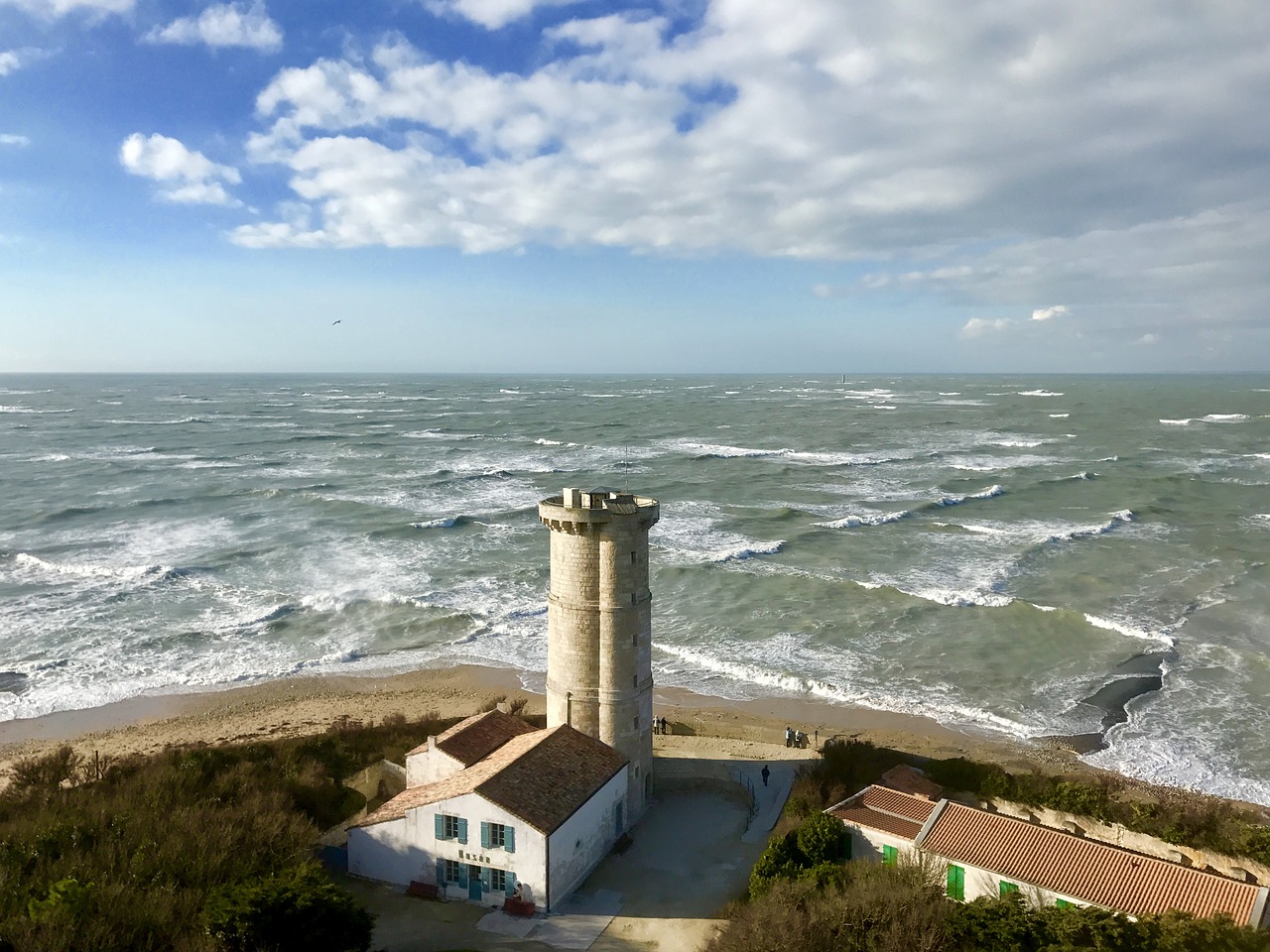 lighthouse sea sky free photo