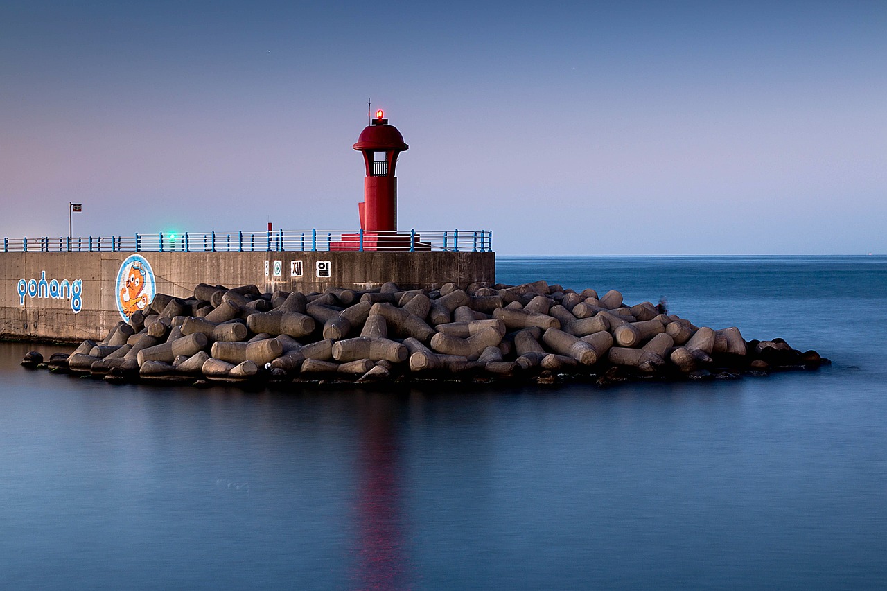 lighthouse sea beach free photo
