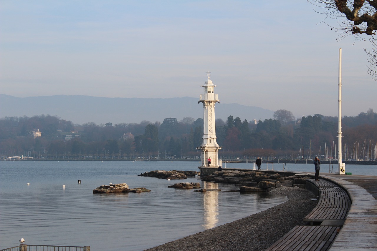 lighthouse sea reflection free photo