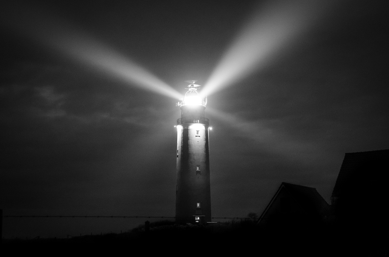lighthouse night sea free photo