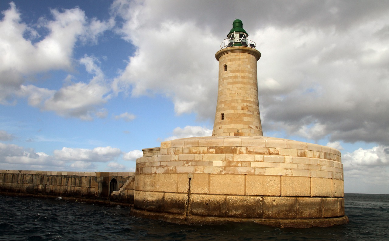 lighthouse water travel free photo