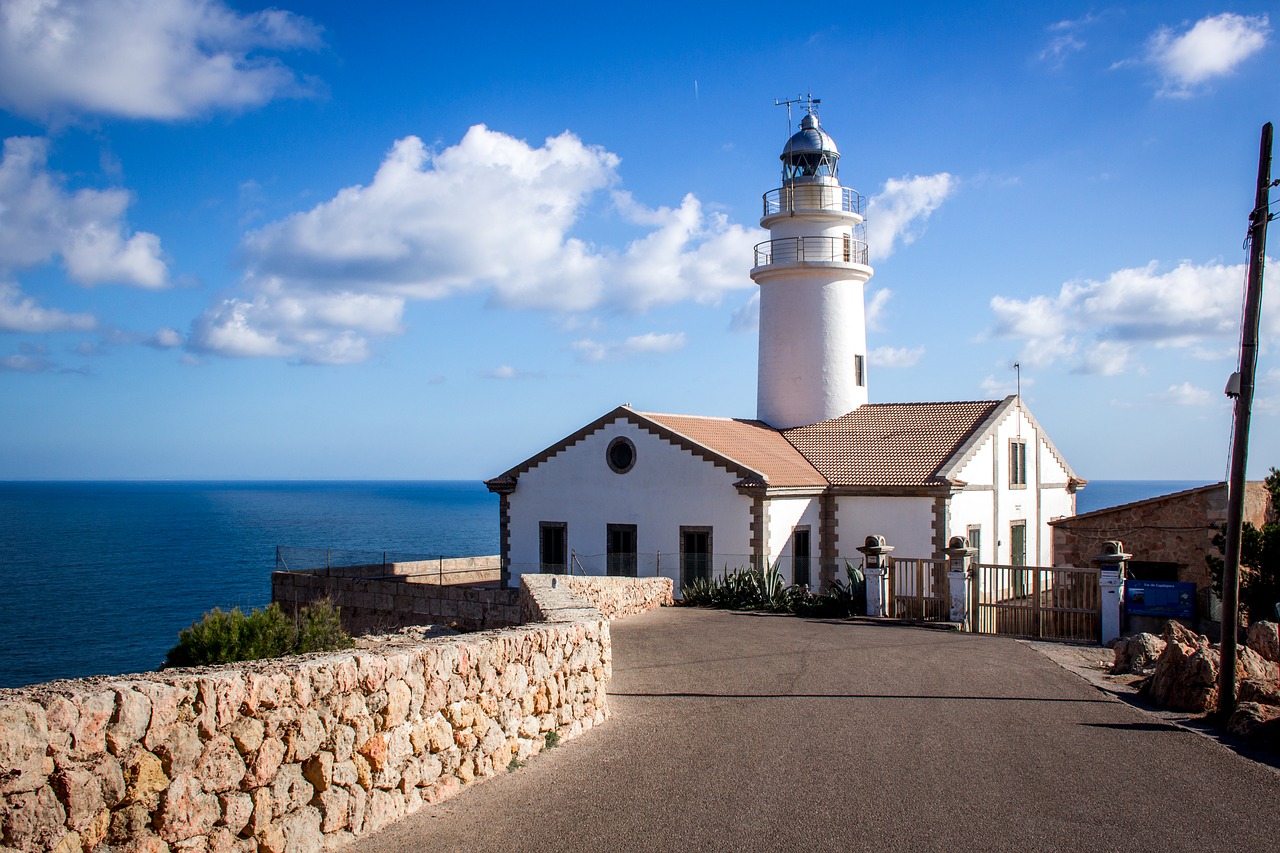 lighthouse sea cliffs free photo