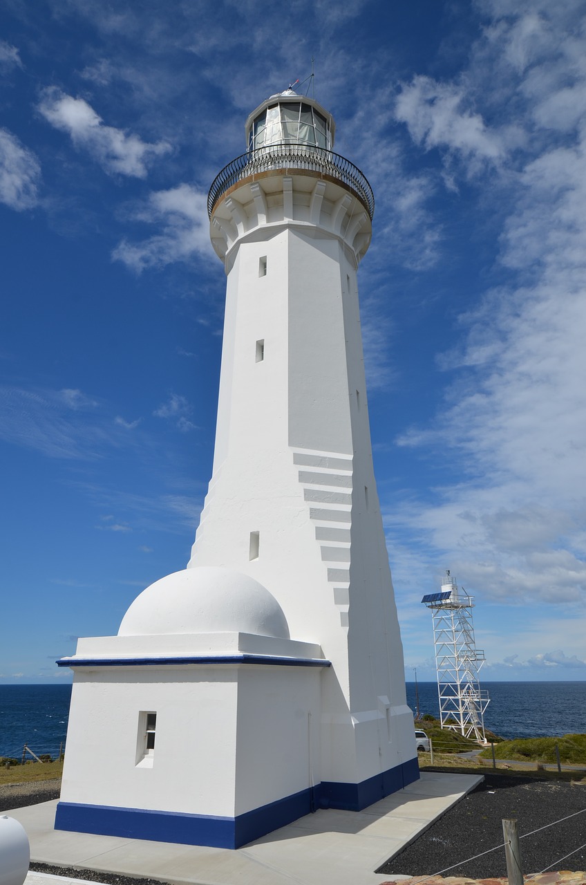 lighthouse  travel  sky free photo