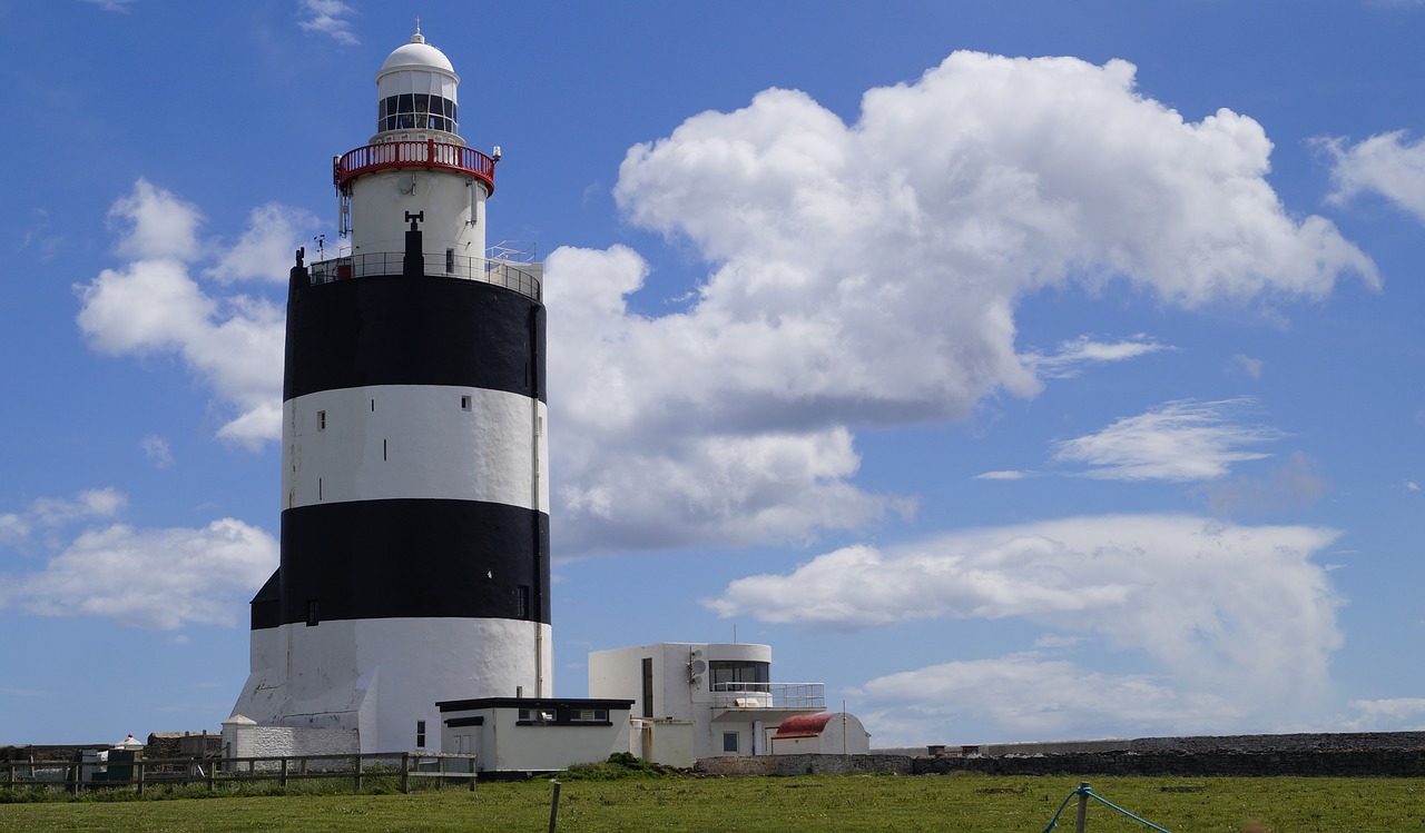 lighthouse  sky  clouds free photo