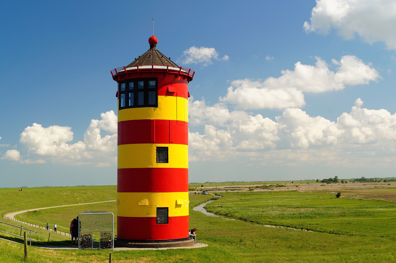 lighthouse pilsumer lighthouse north sea free photo