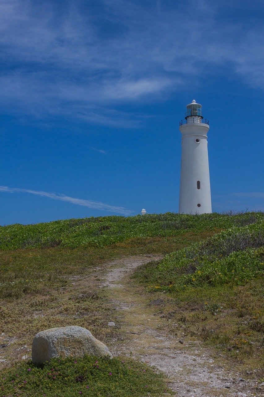 lighthouse  clouds  trail free photo