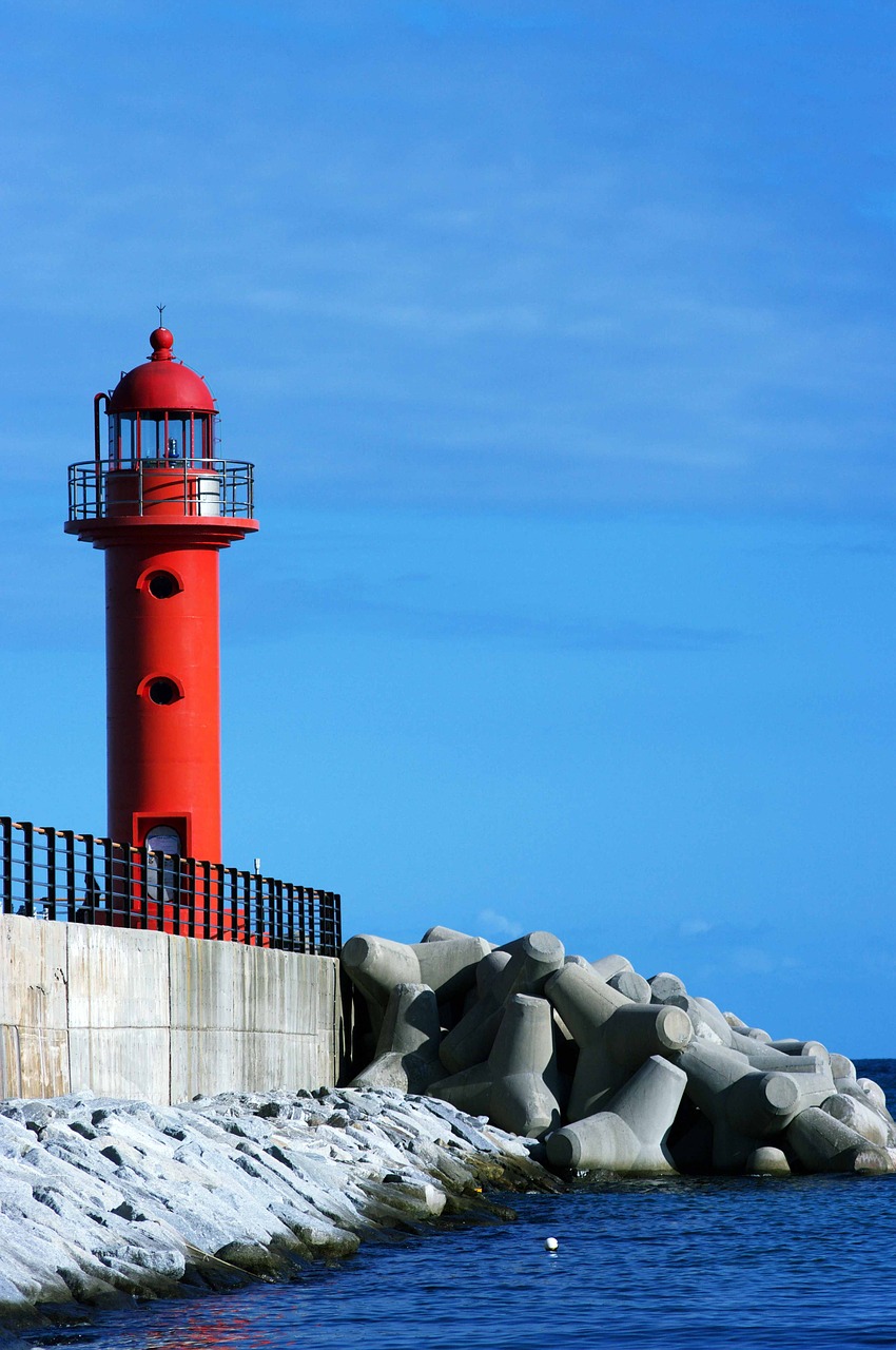 lighthouse  sea  sky free photo