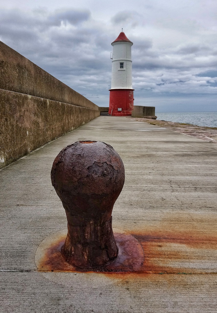 lighthouse  pier  cloud free photo