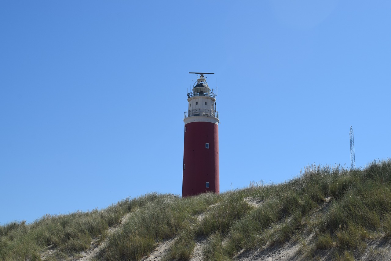 lighthouse  stand  dunes free photo