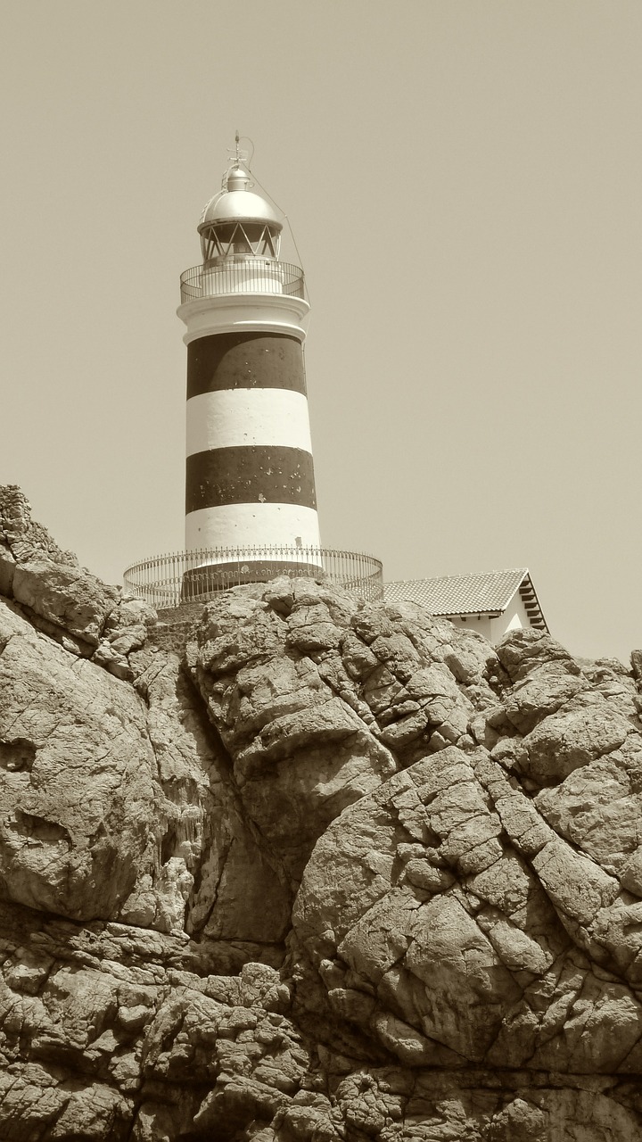 lighthouse cliff rock free photo