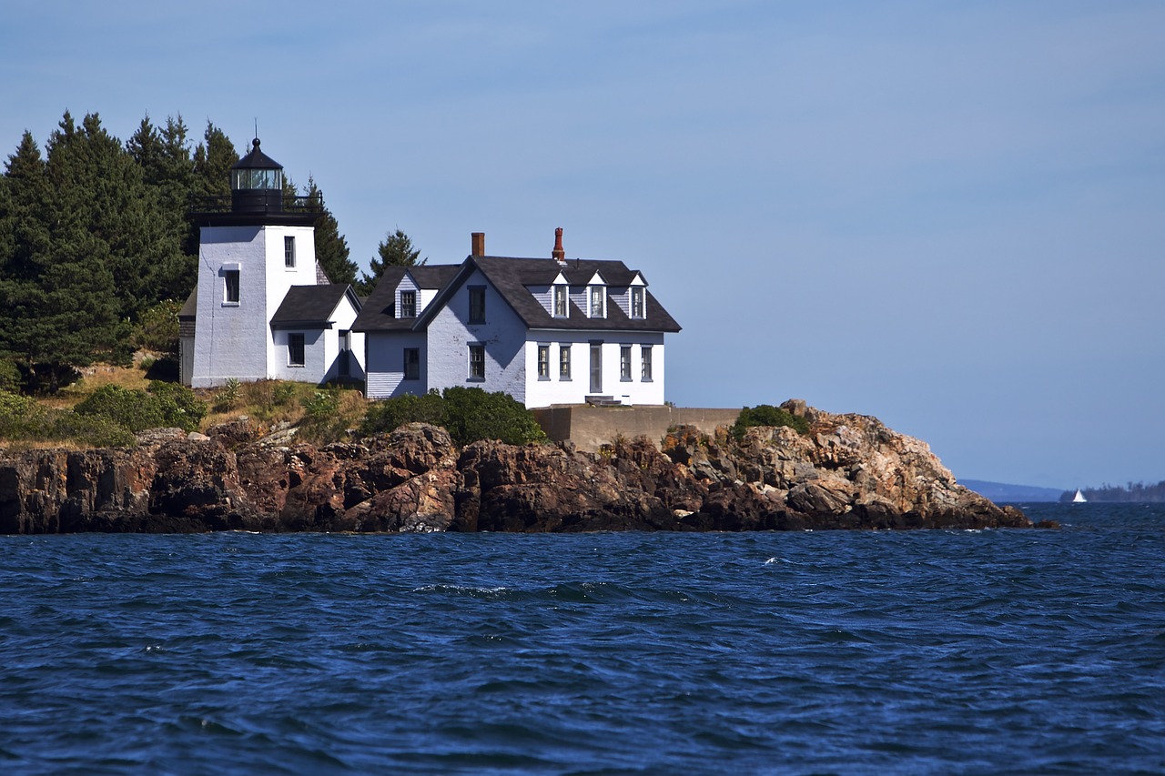 lighthouse  coast  ocean free photo