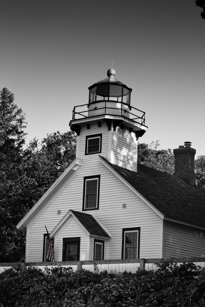 lighthouse  black and white  sky free photo
