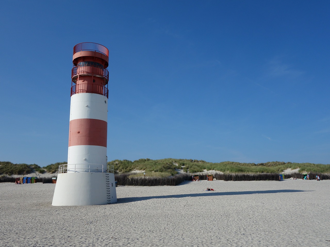 lighthouse sand beach free photo