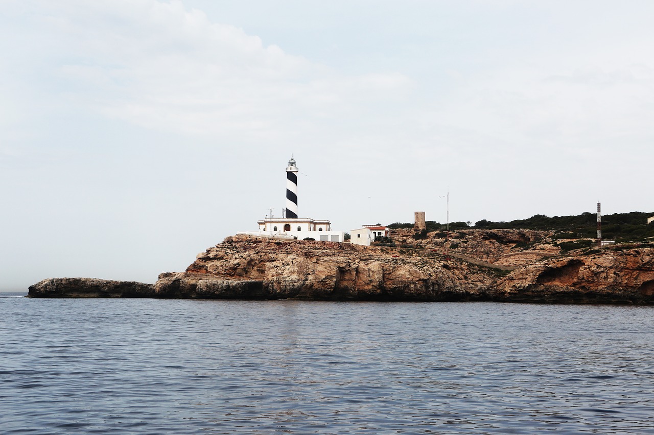 lighthouse shore coast free photo