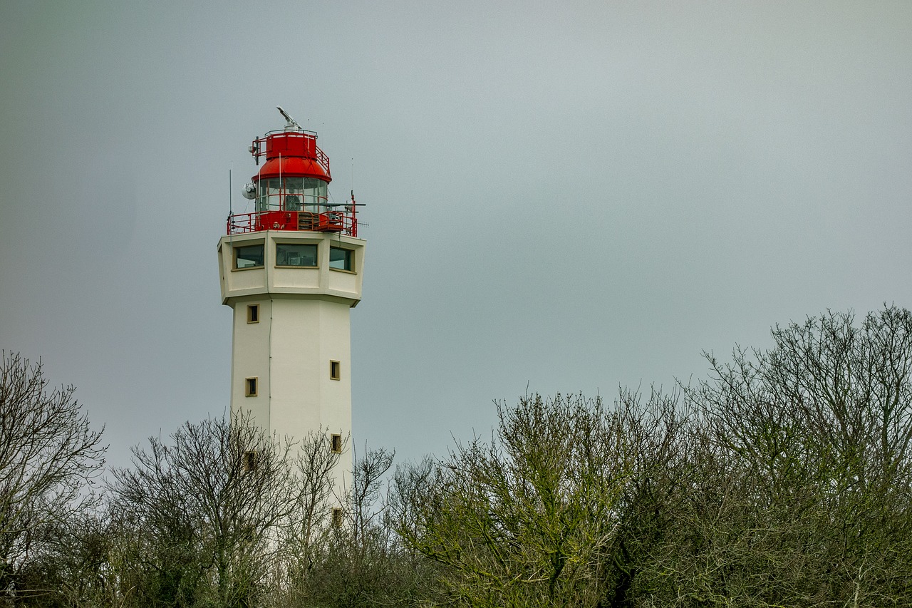 lighthouse  side  sea free photo