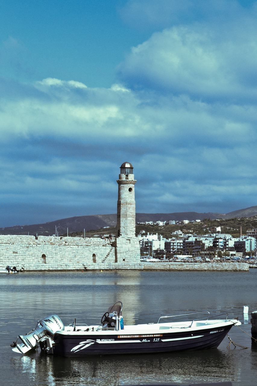 lighthouse  water  boat free photo