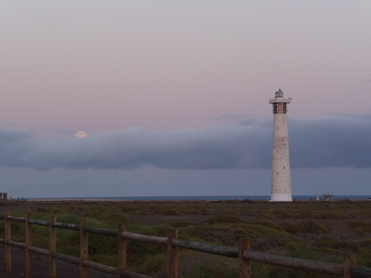 lighthouse moon evening free photo