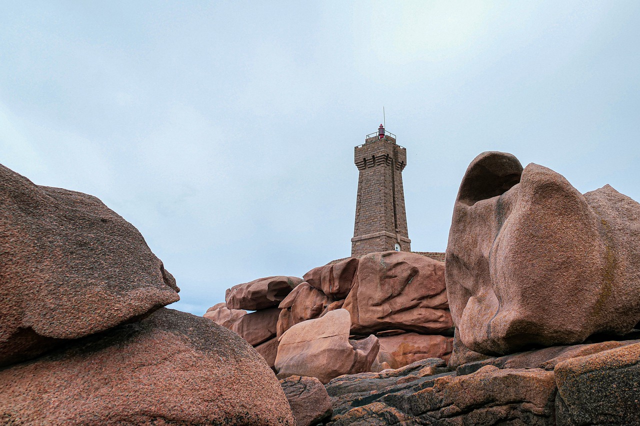 lighthouse  rocks  beach free photo