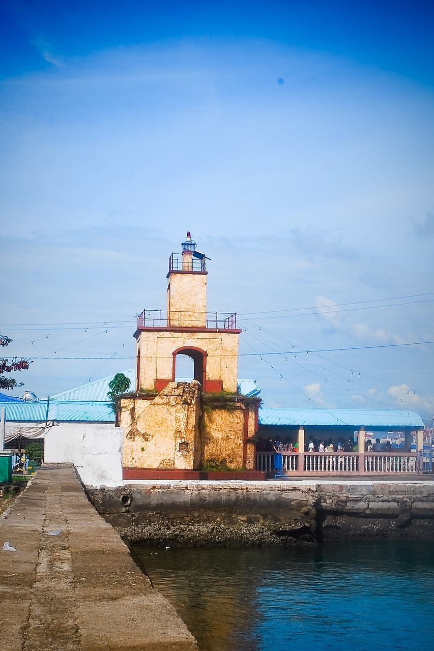 lighthouse pier nature free photo