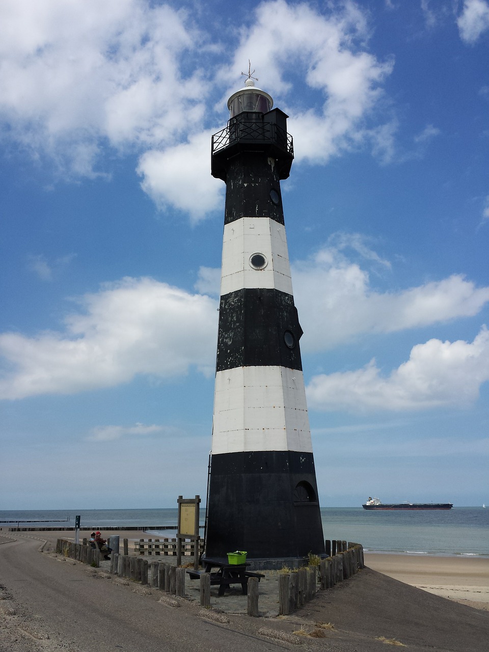 lighthouse beach sea free photo