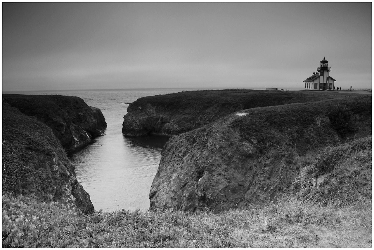 lighthouse shoreline ocean free photo