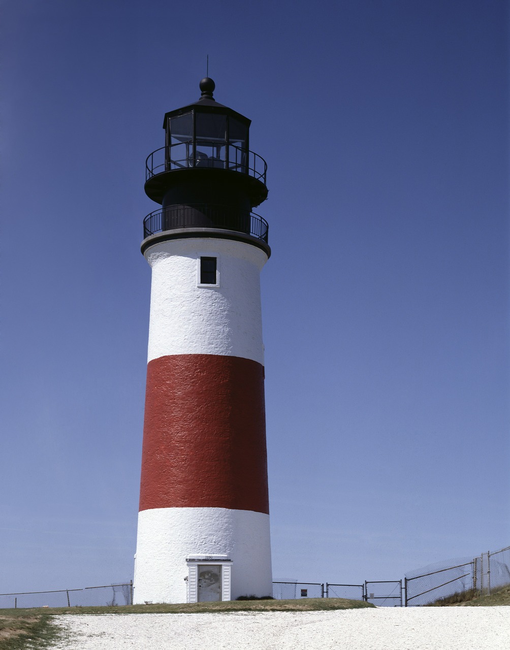 lighthouse shore coast free photo