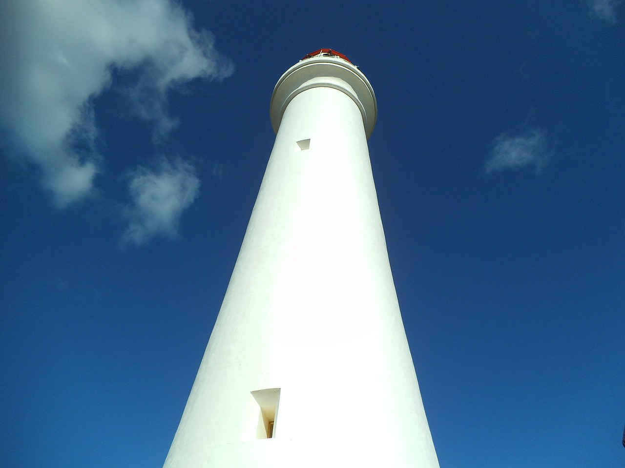 lighthouse sky cloud free photo