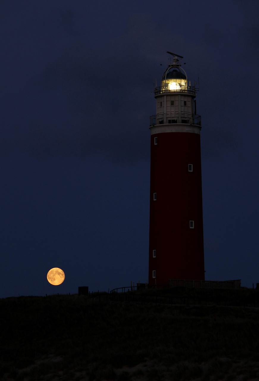 lighthouse night evening free photo