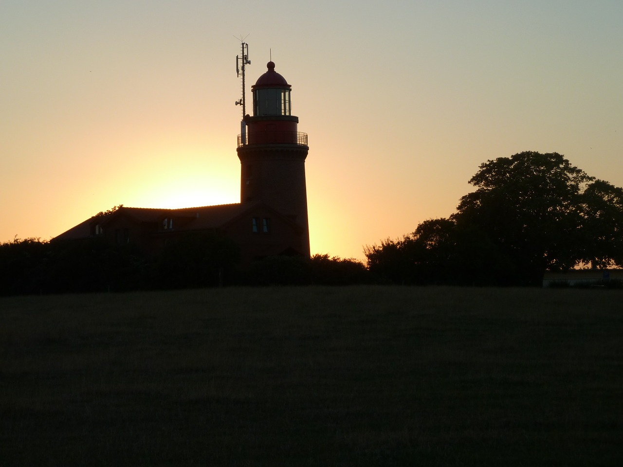 lighthouse evening sun sunset free photo