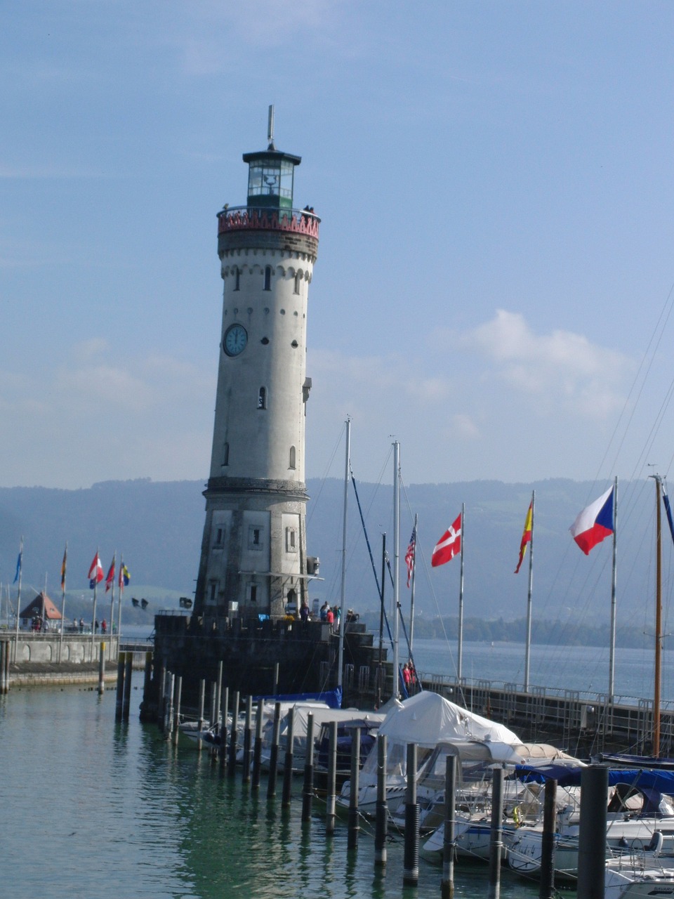 lighthouse port harbour entrance free photo