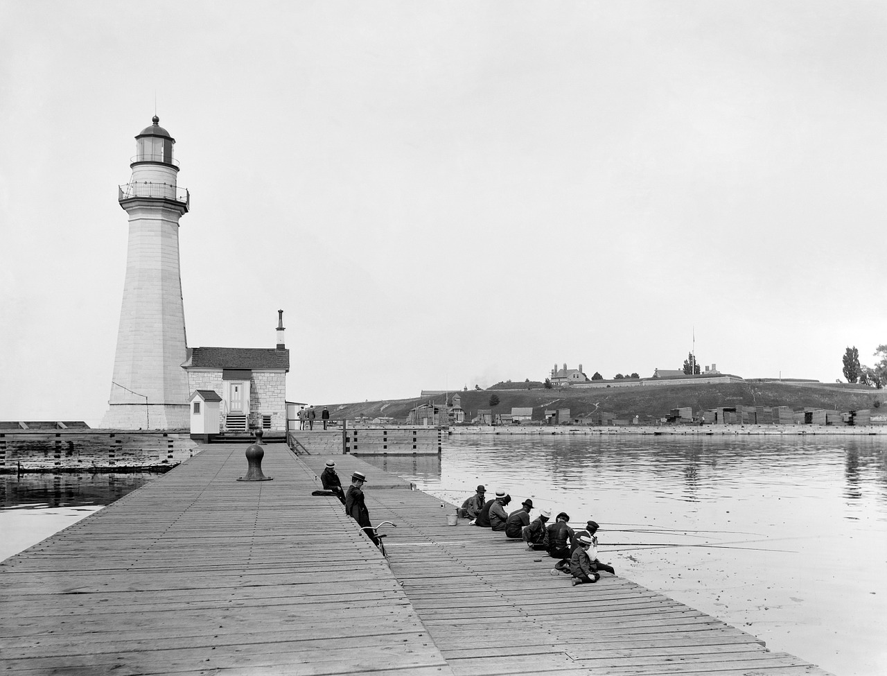 lighthouse pier angler free photo
