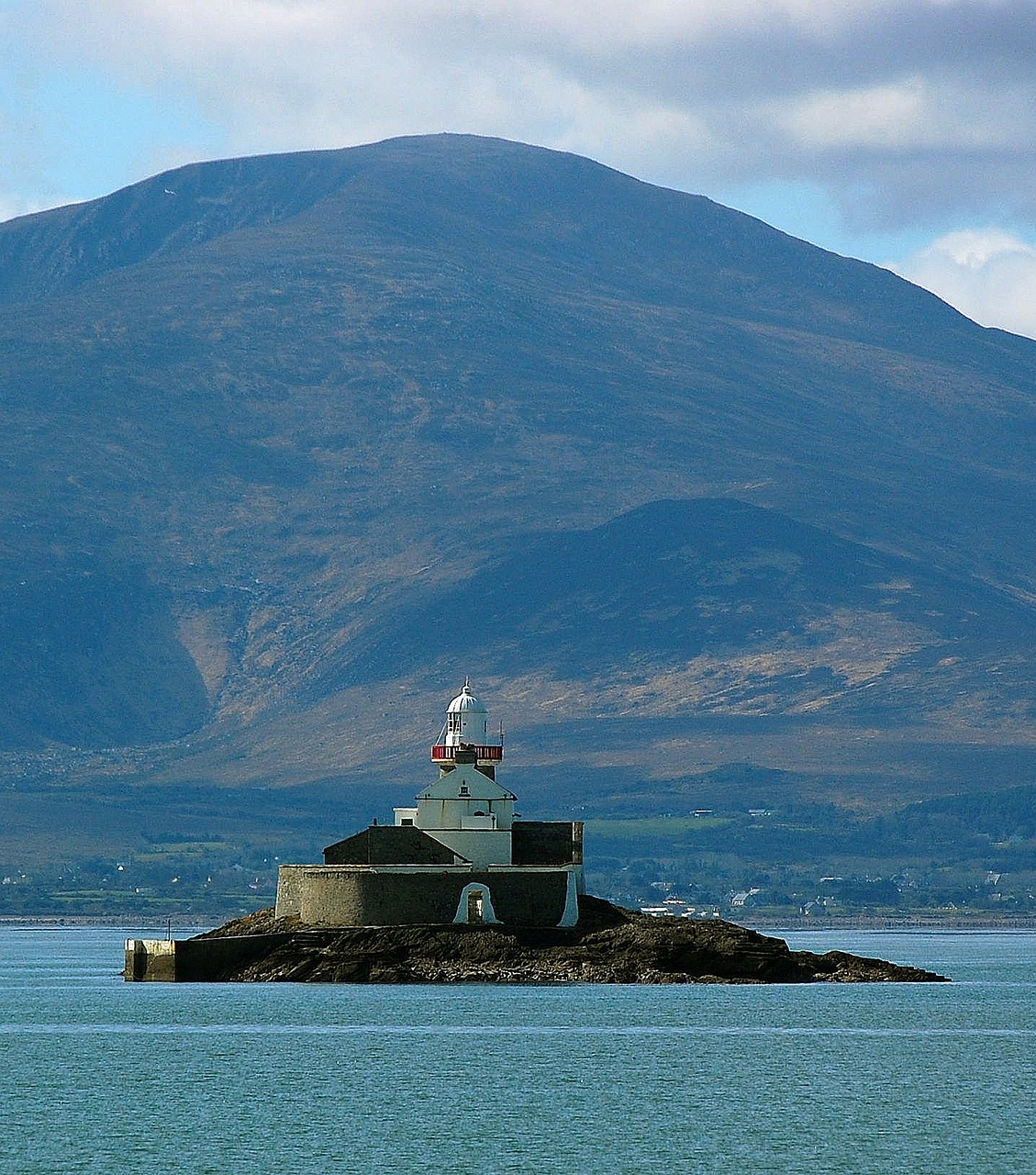 lighthouse ireland mountain free photo